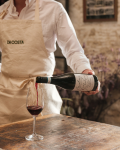 Wine being poured at Da Costa