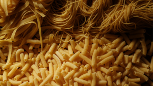 Freshly made pasta in a tray
